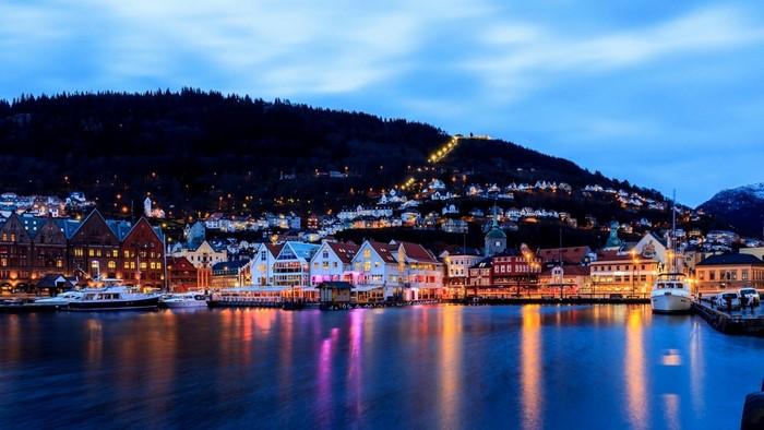 Bergen cityscape with harbor and hills at dusk