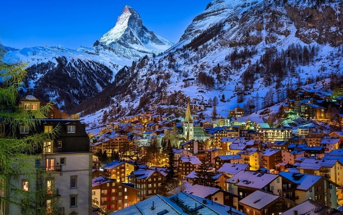 Matterhorn mountain overlooking Zermatt village in winter