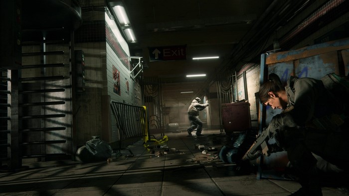 Two characters in a dark subway station, Tom Clancy's The Division