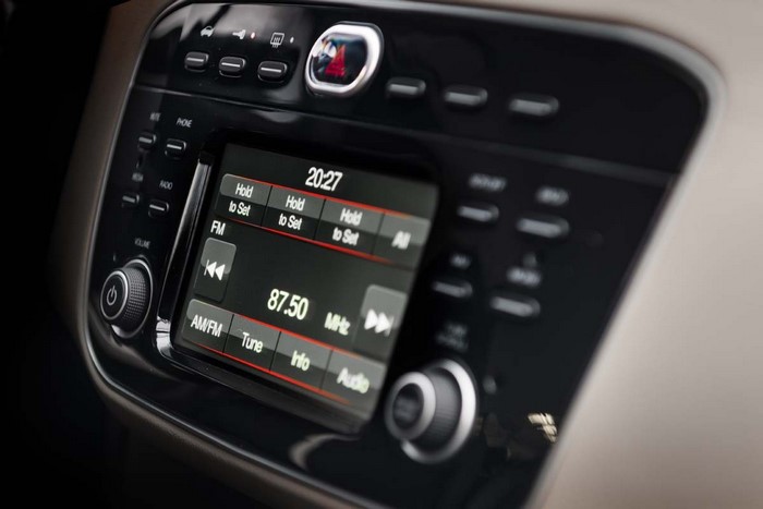 Car infotainment system with radio display