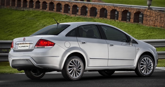 Silver Fiat Linea sedan parked on a road