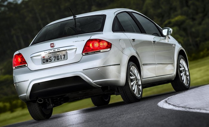 Silver Fiat Linea Absolute sedan on a road