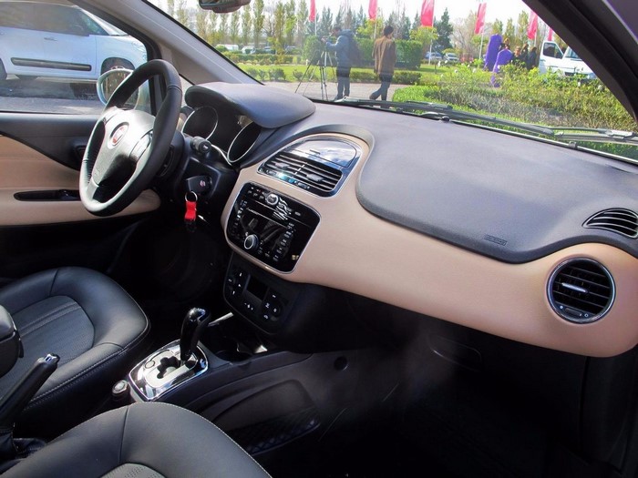 Interior of a Fiat car with dashboard and steering wheel
