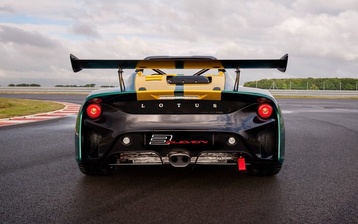 Lotus 3-Eleven race car on a wet track