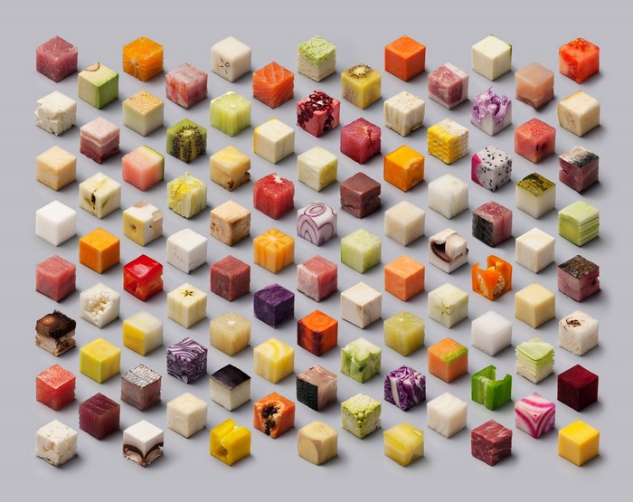 Assortment of food cubes on a gray background