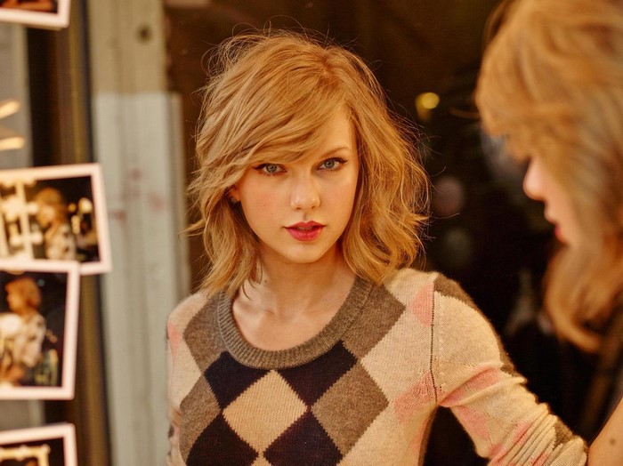Taylor Swift wearing argyle sweater
