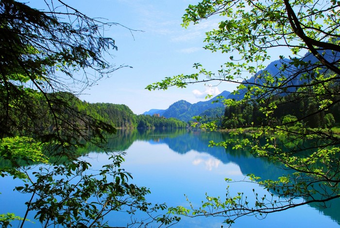 Lake reflection with mountains and trees
