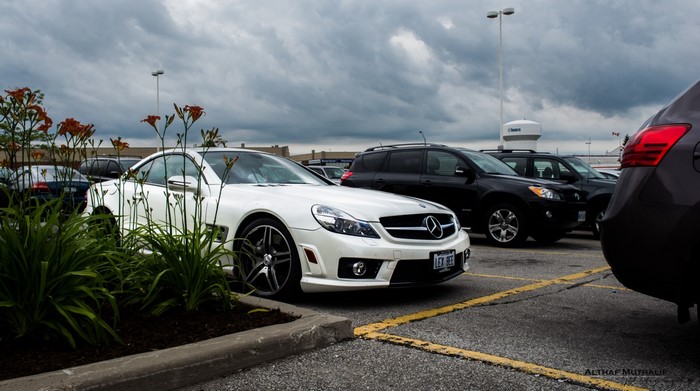 White Mercedes-Benz SL 65 AMG parked in a lot