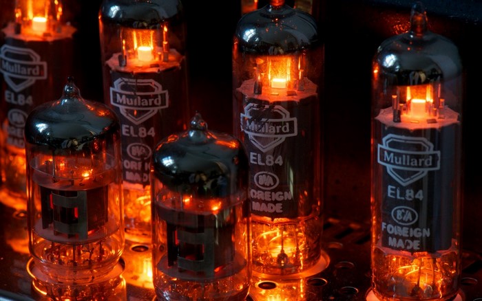 Mullard EL84 vacuum tubes glowing