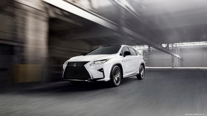 White Lexus RX 350 driving in a warehouse