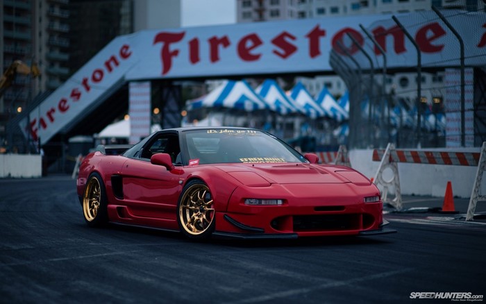 Red Honda NSX with gold wheels at Firestone event