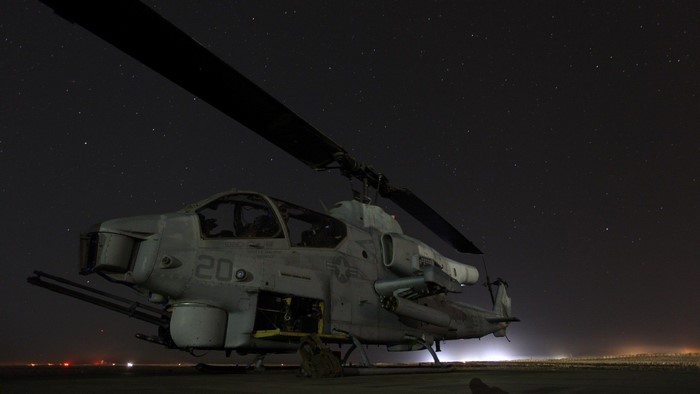 Bell AH-1 SuperCobra helicopter at night
