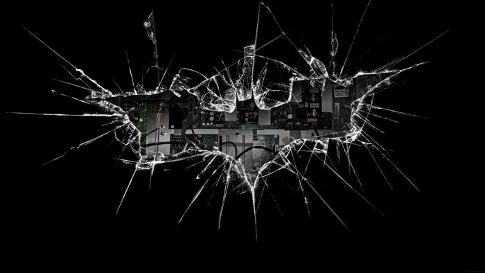 Broken screen with Batman logo and circuit board