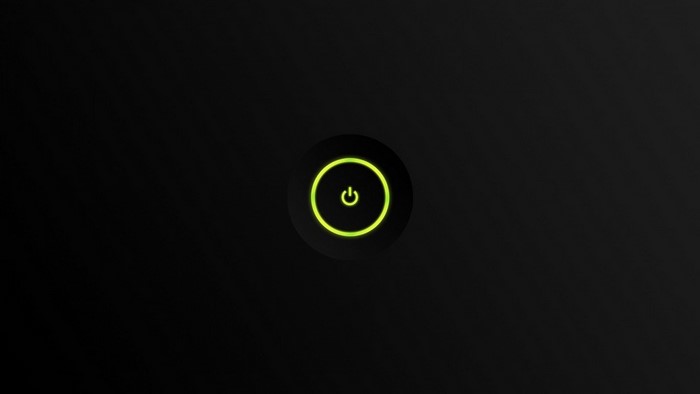 Minimalist black background with green power button logo
