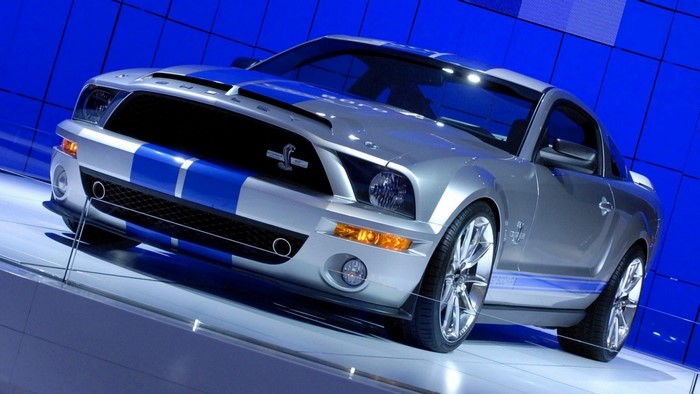 Silver Ford Shelby Mustang GT500 with blue stripes
