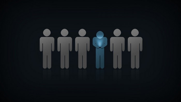 Illustration of a glowing person using a smartphone among others