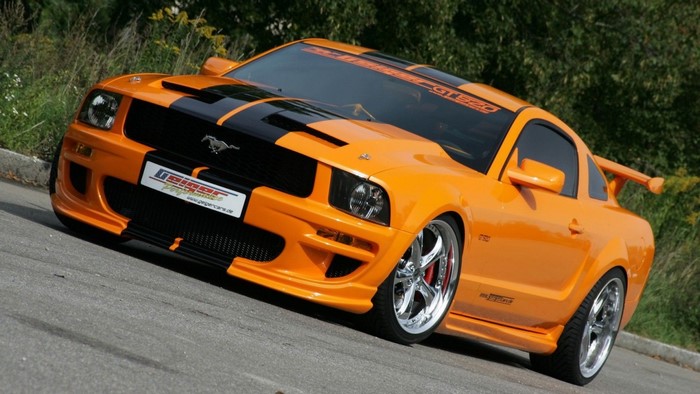 Orange Ford Mustang GT500 with black stripes