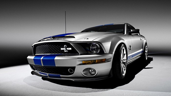Silver Ford Shelby GT500 Mustang with blue stripes