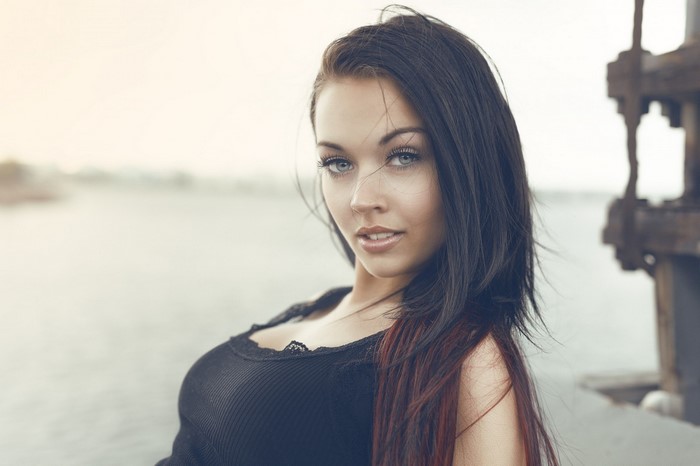 Portrait of Woman with Long Dark Hair by the Water