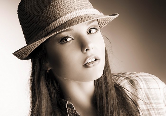 Anett Griffel wearing a hat and plaid shirt