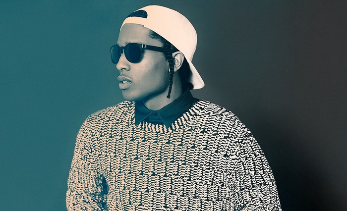A$AP Rocky wearing sunglasses and a patterned sweater