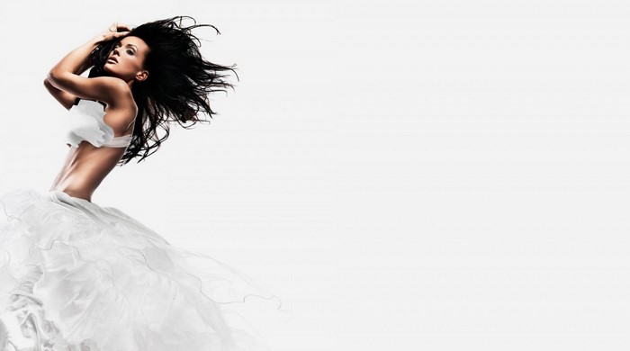 Woman in white dress with black hair