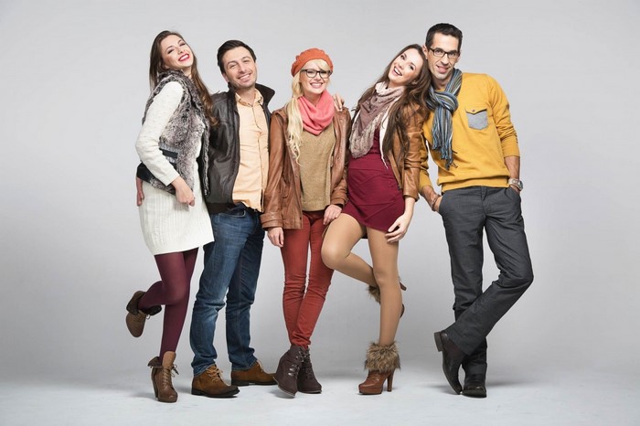 Group of five models posing in fashionable autumn attire