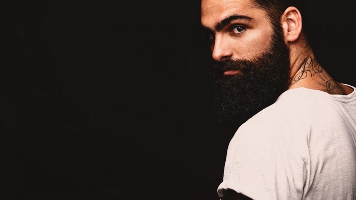 Man with beard and tattoos