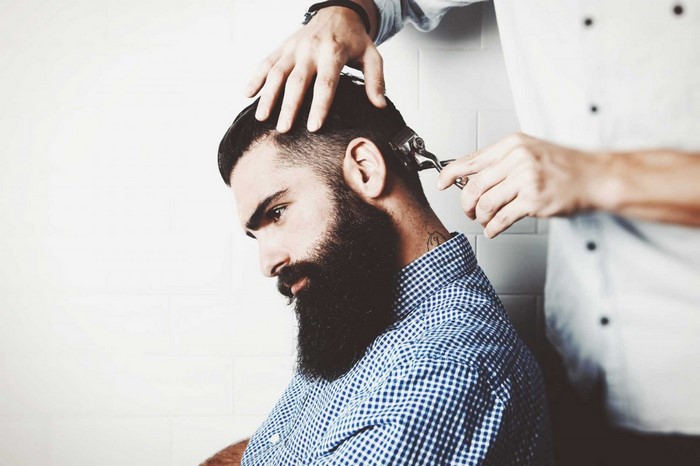 Man getting a haircut with clippers