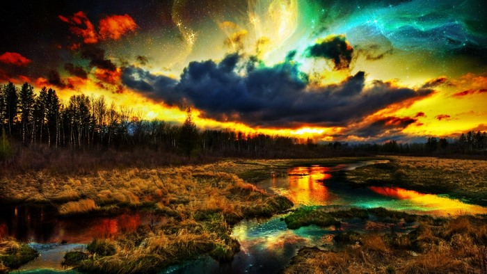 Colorful sky over a river and forest landscape