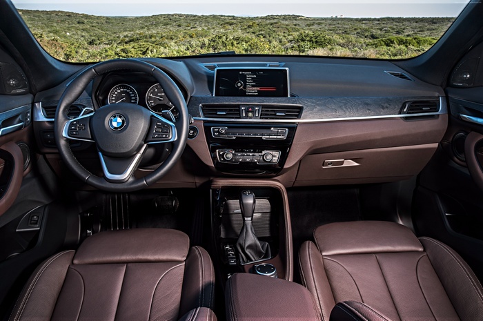BMW X1 interior with dashboard and seats