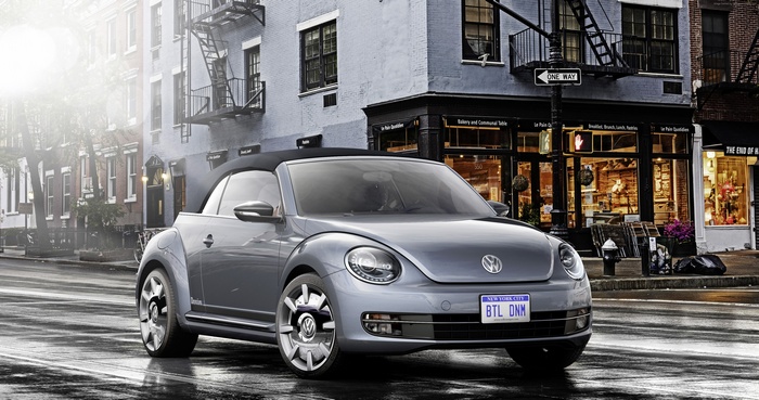 Grey Volkswagen Beetle Cabriolet on a Wet Street