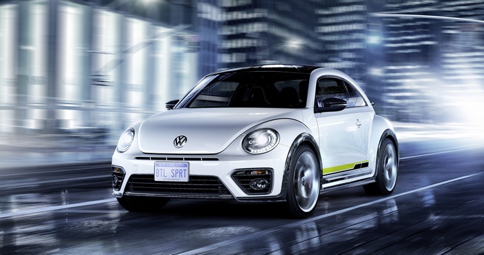 White Volkswagen Beetle R-Line driving at night