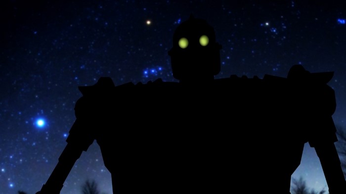 The Iron Giant silhouette against a starry night sky