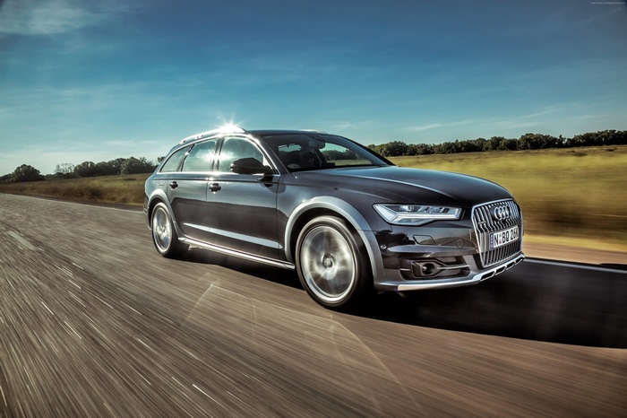 Audi A6 allroad Quattro driving on a road