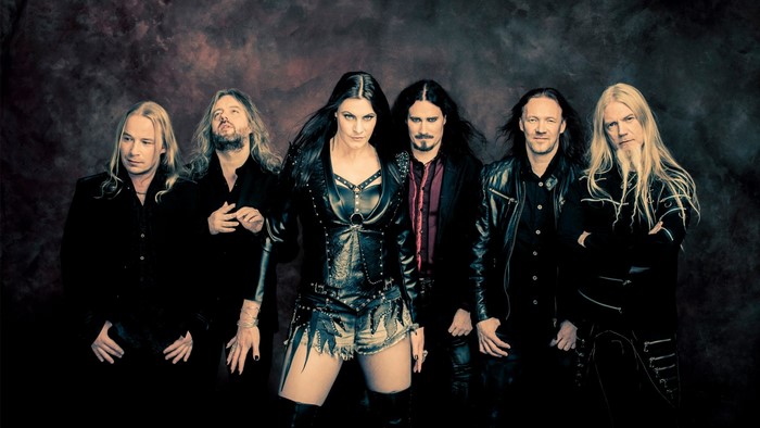 Nightwish band members posing for a photo