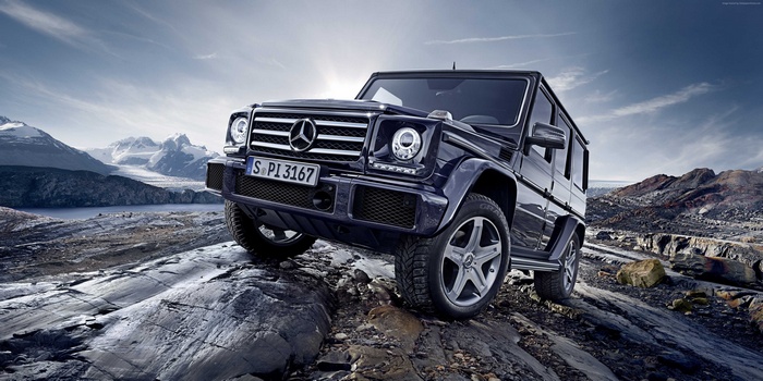 Mercedes-Benz G-Class SUV off-roading on rocky terrain