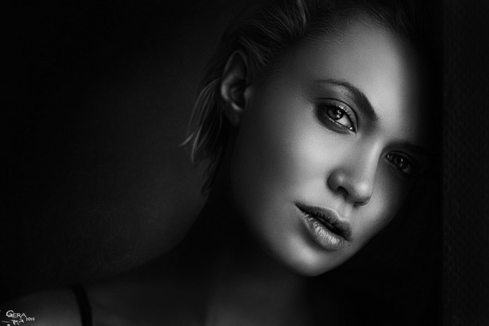 Monochrome portrait of a woman with dramatic lighting