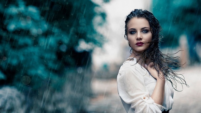 Portrait of Woman with Wet Hair in Rain