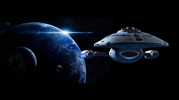 Star Trek: Voyager spacecraft near a planet