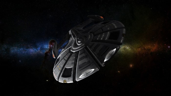 U.S.S. Insignia spaceship in outer space