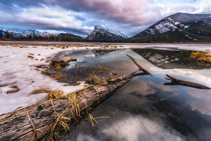 Winter lake with mountains and reflection