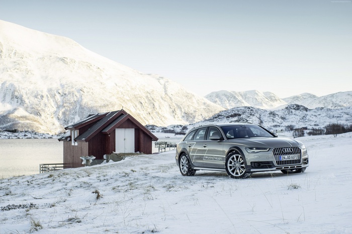 Audi A6 allroad Quattro in snowy landscape