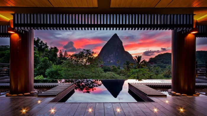 Luxury resort infinity pool overlooking Pitons at sunset