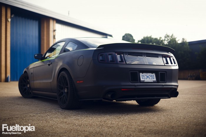 Matte black Ford Mustang RTR with green accents