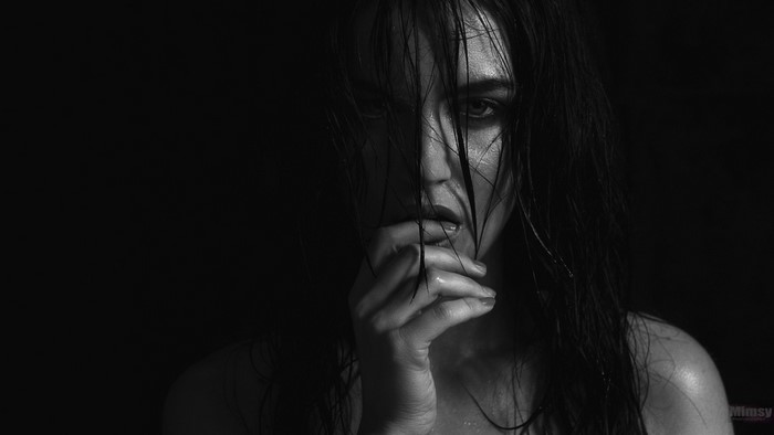 Monochrome portrait of a woman with wet hair