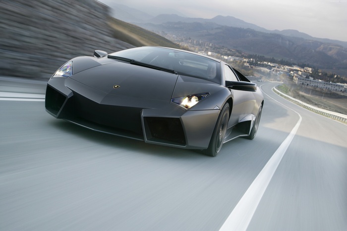 Lamborghini Reventon driving on a winding road