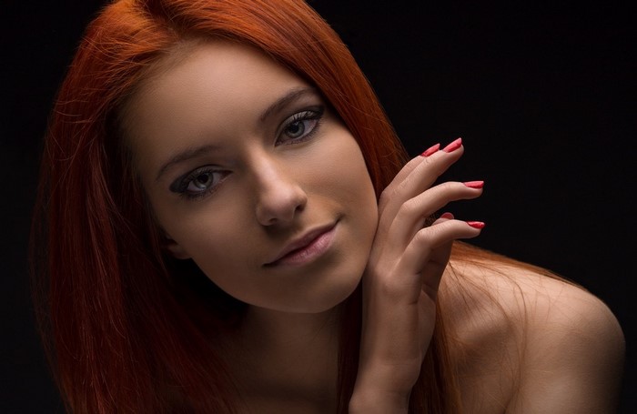 Portrait of a Woman with Long Red Hair