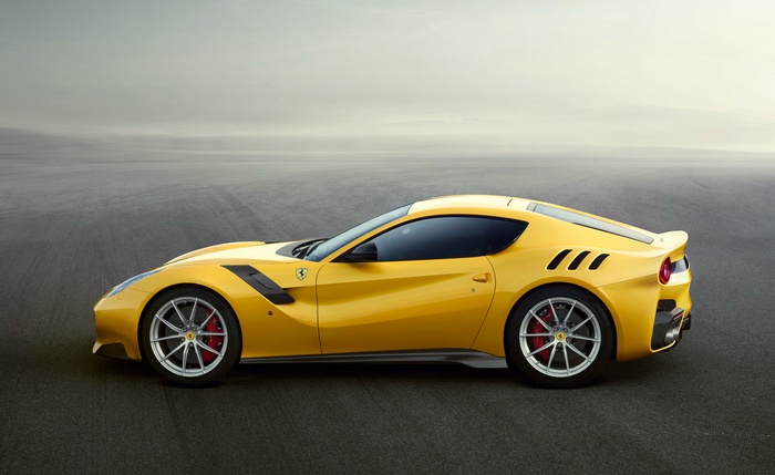 Yellow Ferrari F12 TDF sports car