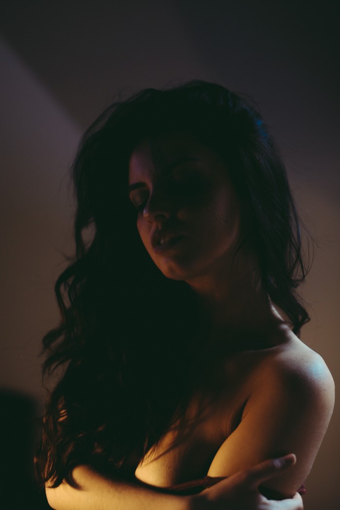 Aurela Skandaj portrait with long dark hair